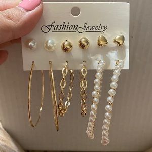 6 pair earrings. 3 studs, 3 hoops